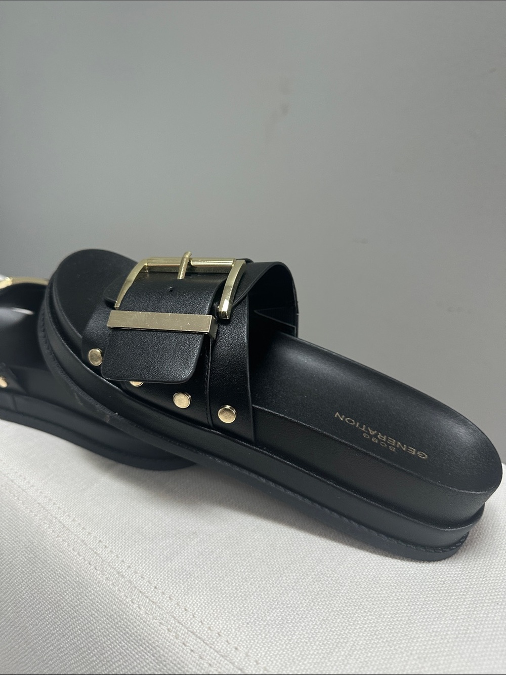 BCBGeneration Black Leather Slide Sandals with Gold Buckles
